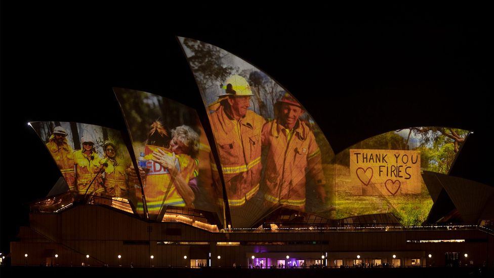 After the 'Black Summer' bushfires of 2020, the tired faces of firefighters who had battled the flames were projected onto it (Credit: Brook Mitchell/Getty Image)