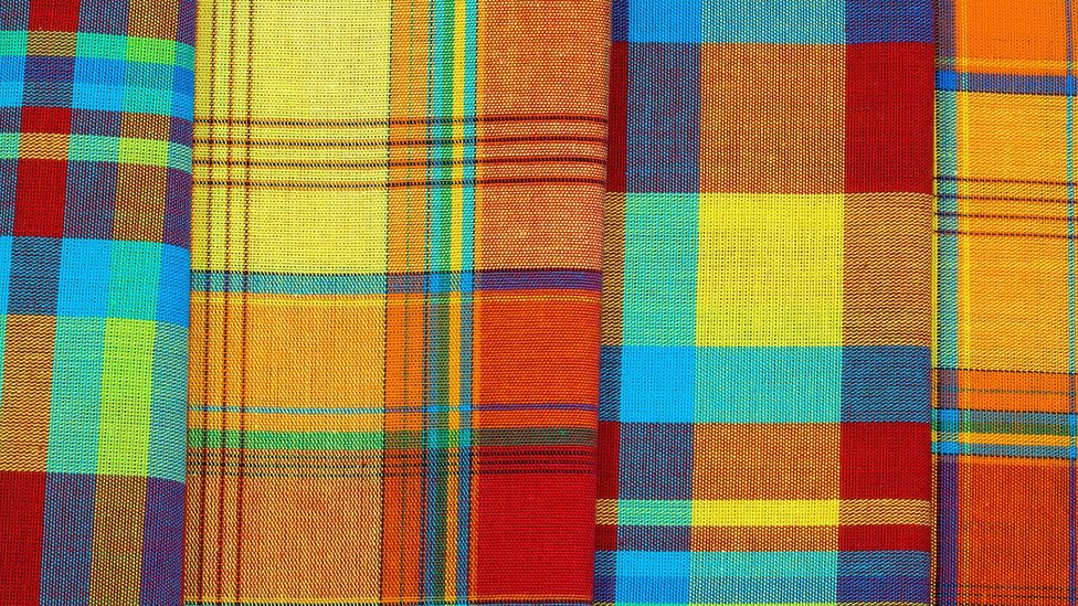 Some have suggested Madras check is inspired by Scottish tartan – but the cloth existed for hundreds of years before the arrival of the British (Credit: Alamy)