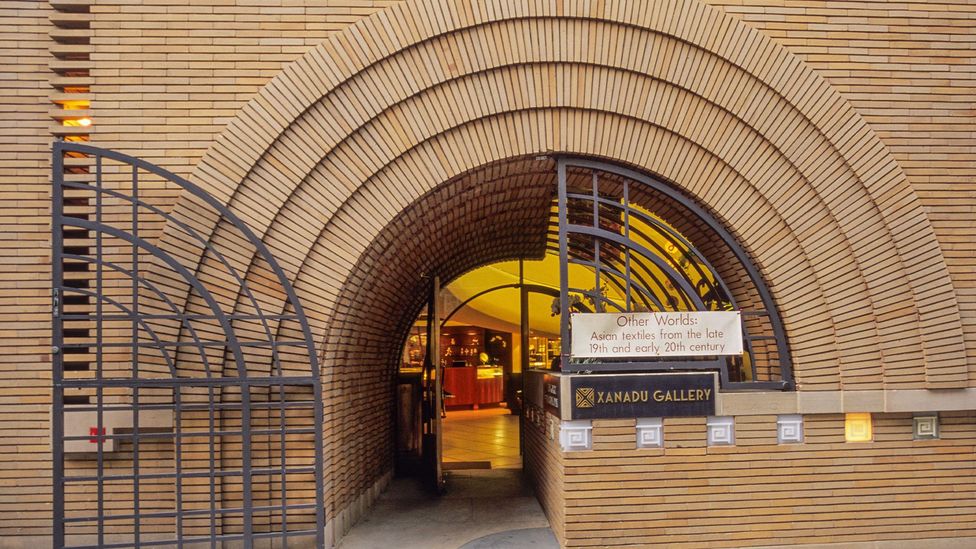 The Frank Lloyd Wright Building's simple brick-wall exterior belies its masterfully rendered interior (Credit: Charles O Cecil/Alamy)