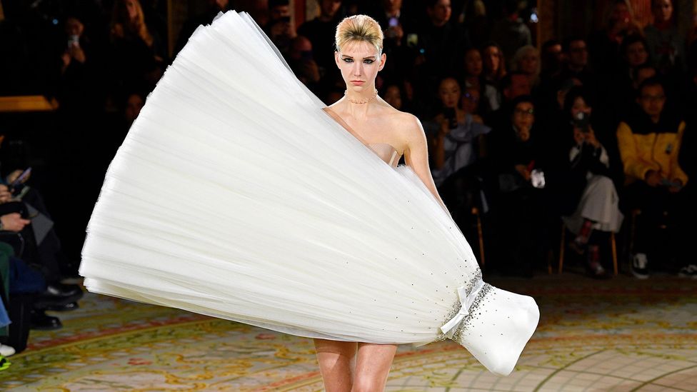 The tulle ball gown was worn at unexpected angles at Viktor & Rolf's catwalk show (Credit: Getty Images)