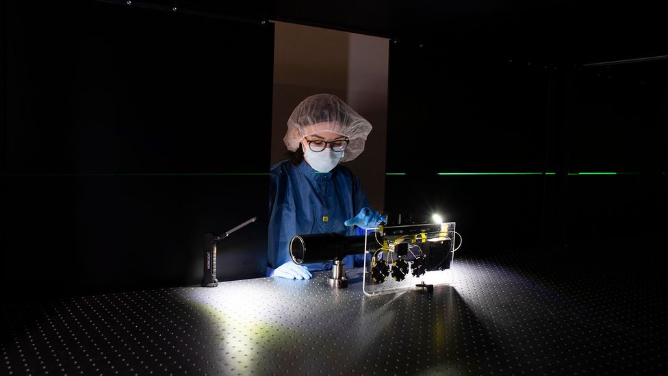 Laser engineer Lauren Weinberg works on the Zeus laser system (Credit: Marcin Szczepanski/Michigan Engineering)