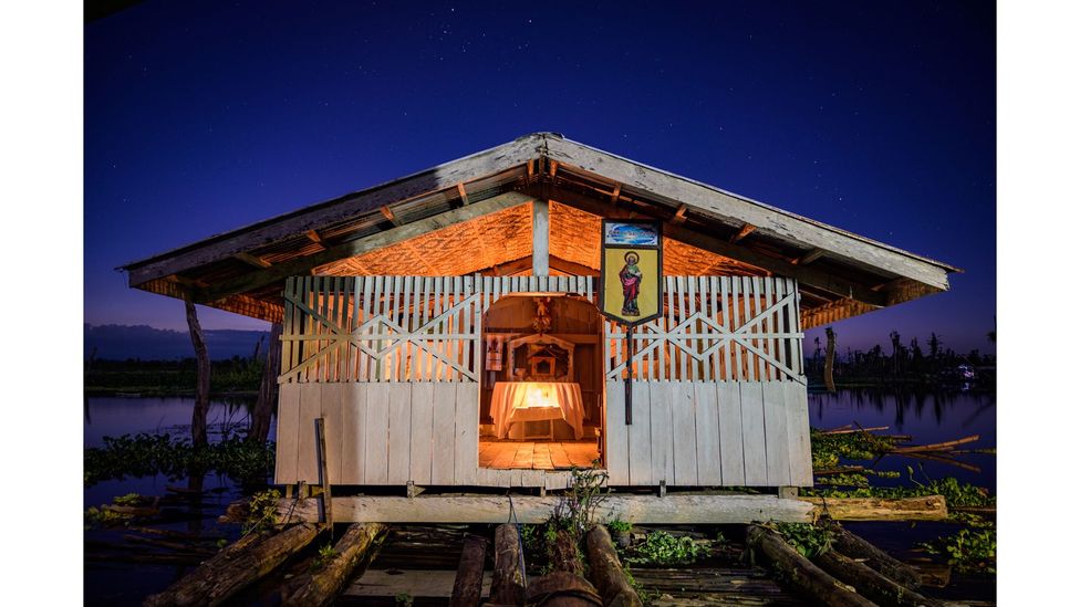 Floating houses, chapels and animal pens in the marshlands are built on modular rafts that adapt to the rise and fall of the water (Credit: Gab Mejia)