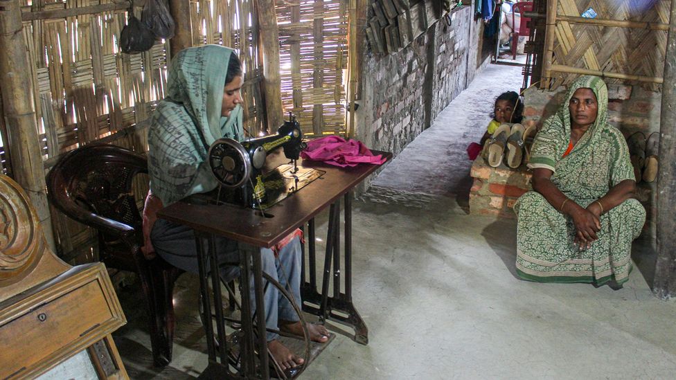 Umme Sultana, is able to contribute to her family‍‍`s earnings and pay for her education after receiving a sewing machine from YPSA (Credit: Sadiqur Rahman)