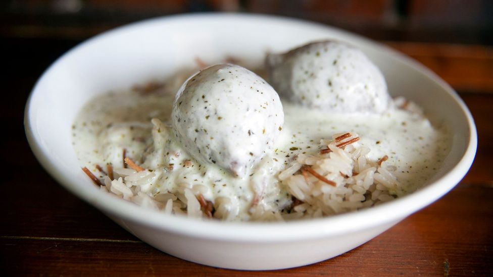 Kibbeh labaniyeh (meatballs in yoghurt sauce) are eaten on New Year's Day in Lebanon (Credit: Tessa Fox)