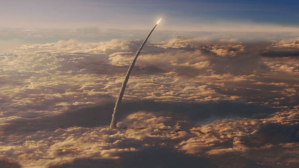 An artists impression of the SLS in flight above the clouds (Credit: Nasa)