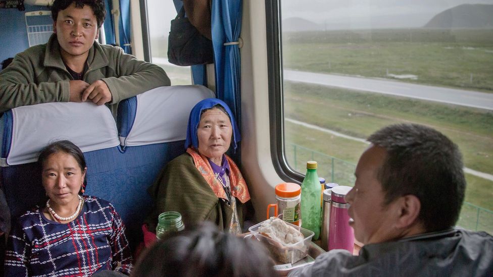 Riding alongside Tibetans is one of the most rewarding parts of the Qinghai-Tibet railway (Credit: Imaginechina Limited/Alamy)