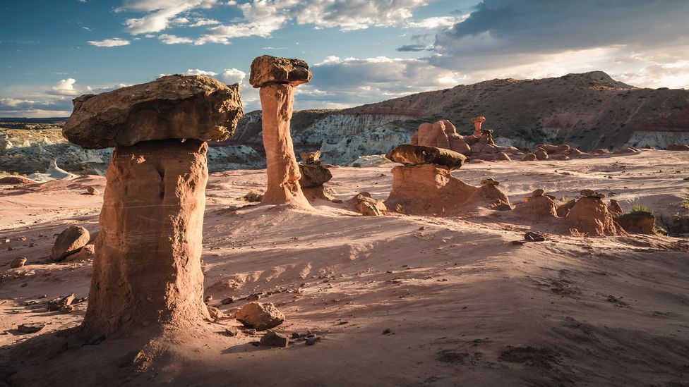 A hiker at Jacob Hamblin Arch in Coyote Gulch, Grand Staircase-Escalante National Monument