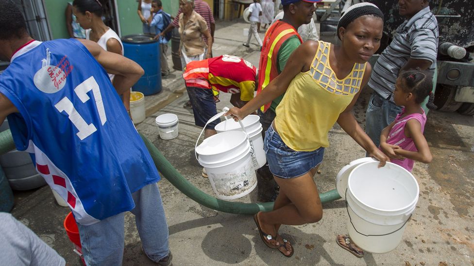 Many people in the Dominican Republic have to rely on bottled water or water tankers because access to safe, potable supplies is unreliable (Credit: Getty Images)