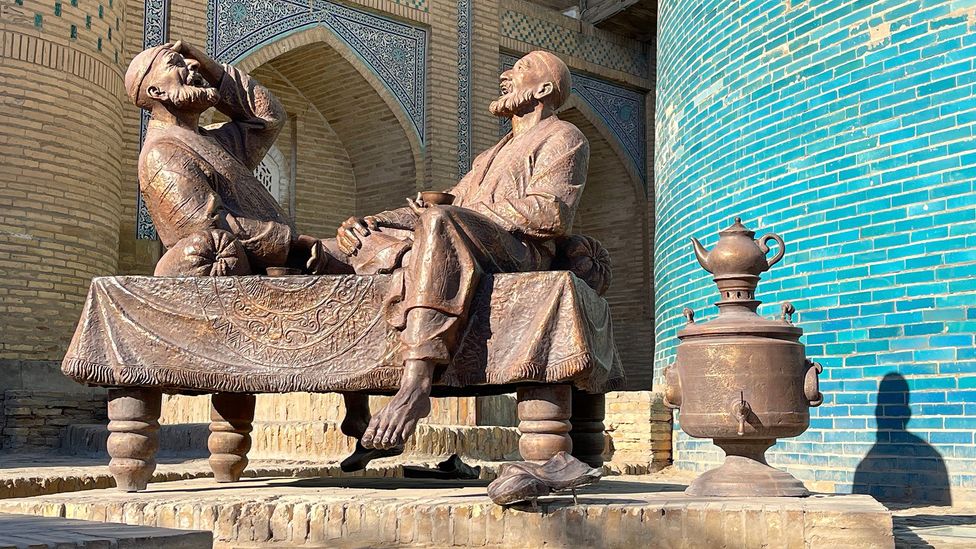 In the Itchan Kala is a life-size street statue of two men chatting with a samovar bubbling away at their feet (Credit: Charukesi Ramadurai)