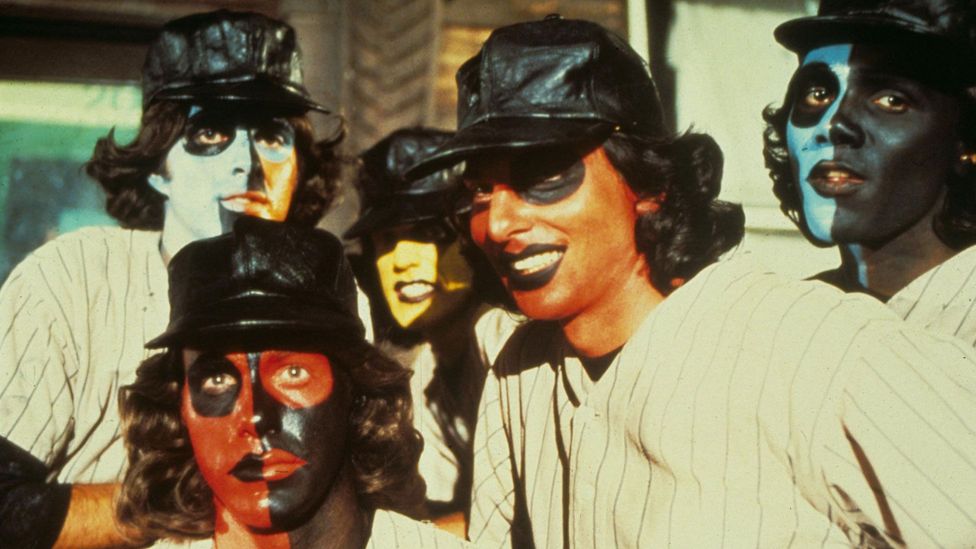 One of the gangs, The Baseball Furies, wear baseball uniforms and have brightly coloured 'warpaint' on their faces (Credit: Alamy)