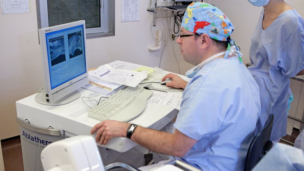 A man performing an ultrasound of prostate cancer (Credit: Alamy)
