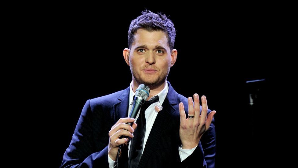 Several celebrities, including Canadian singer Michael Bublé, have begun wearing men's engagement rings, propelling the trend (Credit: Alamy)