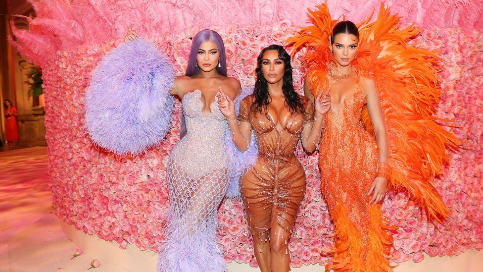 Kim Kardashian (centre) wore a latex, beaded custom Mugler dress to the Met Gala in 2019 (Credit: Getty Images)