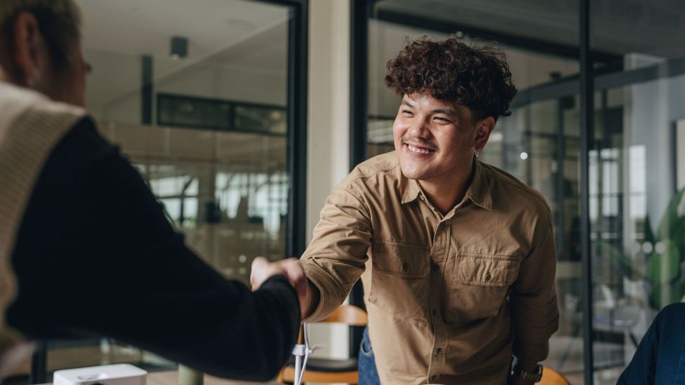 Gen Z may not have to change themselves to succeed in the workplace – but they may want to change their language for now (Credit: Getty Images)