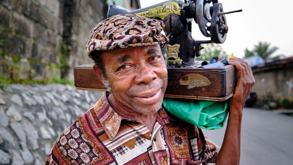 Mobile tailors in Nigeria became known as "obiomas" in the 1970s (Credit: Getty Images)