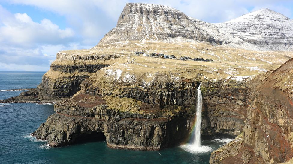 Múlafossur waterfall is one of the biggest tourist attractions on the Faroe Islands (Credit: Mike MacEacheran)