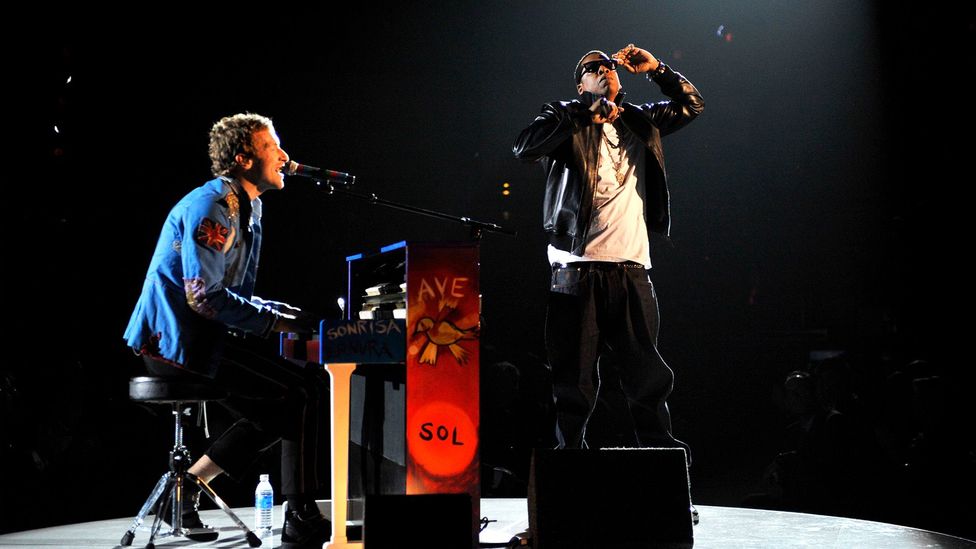 Coldplay fans and collaborators include Jay-Z (pictured on stage with Chris Martin), Stormzy and Nick Cave (Credit: Getty Images) Coldplay fans and collaborators include Jay-Z (pictured on stage with Chris Martin), Stormzy and Nick Cave (Credit: Getty Images)