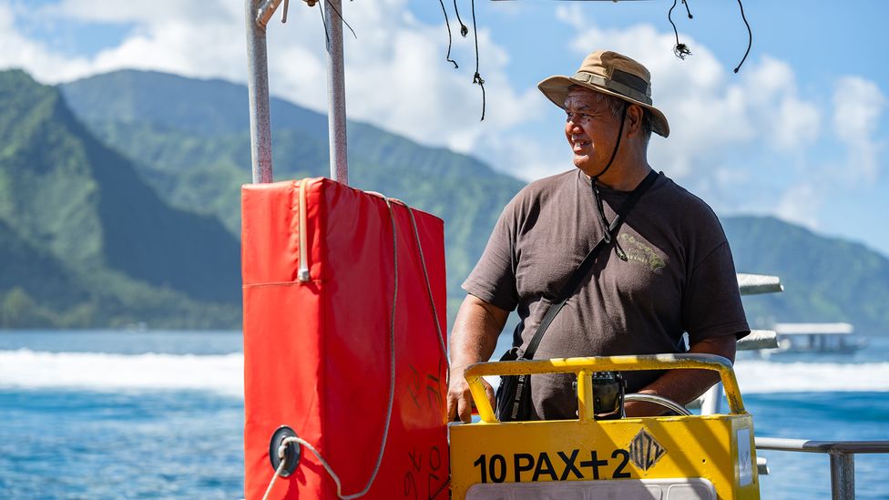 Timothée Faraire, a local taxi boat driver, says he is receiving very little pay for captaining his boat for Olympic officials (Credit: Atea Chip Lee Sao) Timothée Faraire, a local taxi boat driver, says he is receiving very little pay for captaining his boat for Olympic officials (Credit: Atea Chip Lee Sao)