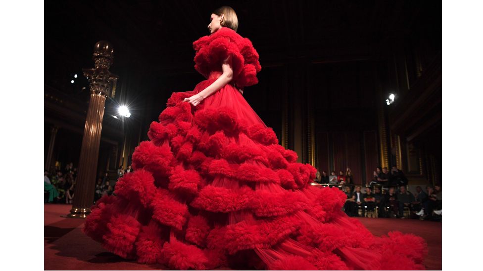 The American luxury designer is known for his signature flowy, flattering silhouettes. (Photo: Getty Images)