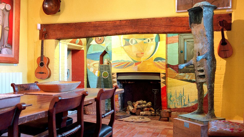 The fireplace in the Farleys' dining room, a place where famous guests often gathered in the art-filled Miller and Penrose home. (Photo by Tony Tree/Lee Miller Archive)