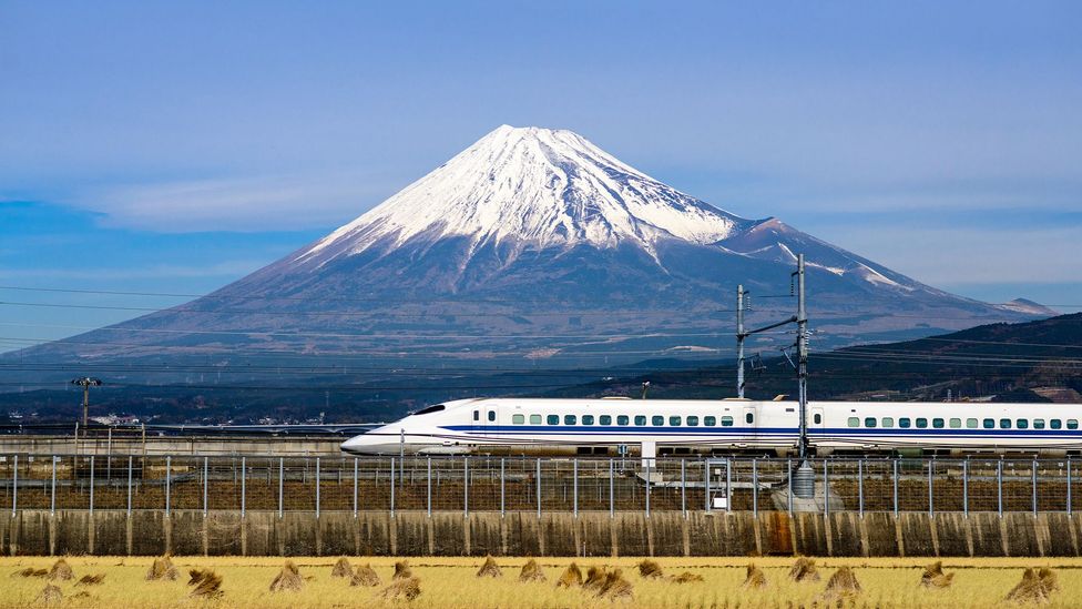 A bullet train in Japan with Mt Fuji in the background (Credit: Alamy)