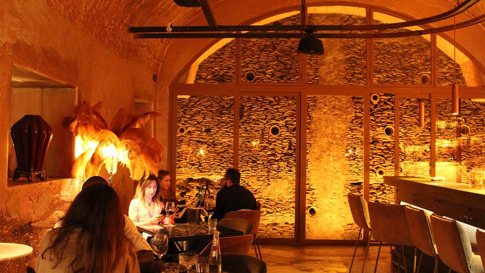 Today, several restaurants built into Monte Testaccio feature ancient amphorae in their walls (Credit: Lidija Pisker) Today, several restaurants built into Monte Testaccio feature ancient amphorae in their walls (Credit: Lidija Pisker)
