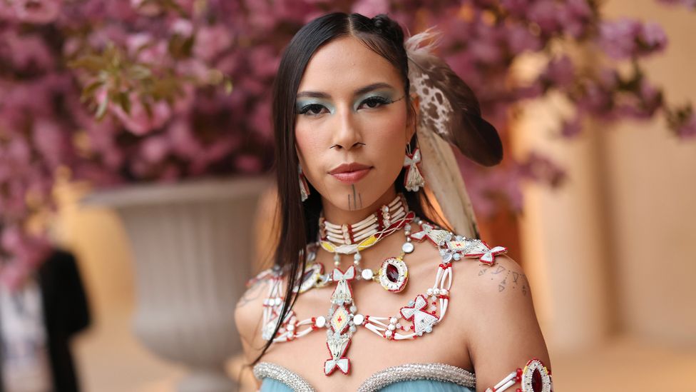 The 22-year-old model's geometric tattoo on her chin is sacred to her Alaskan tribal culture (Credit: Getty Images)