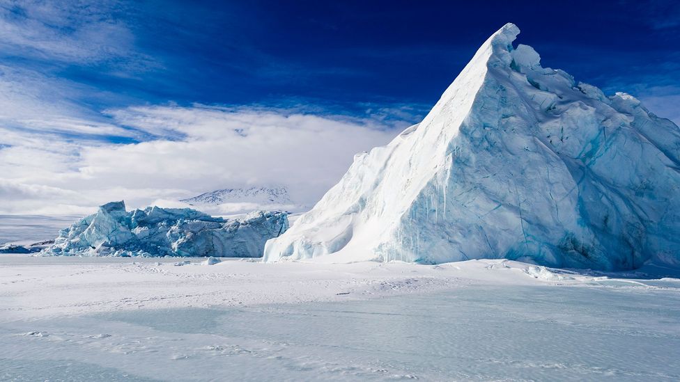 An iceberg trapped in sea ice at Erebus Bay, McMurdo Sound (Credit: Getty Images)