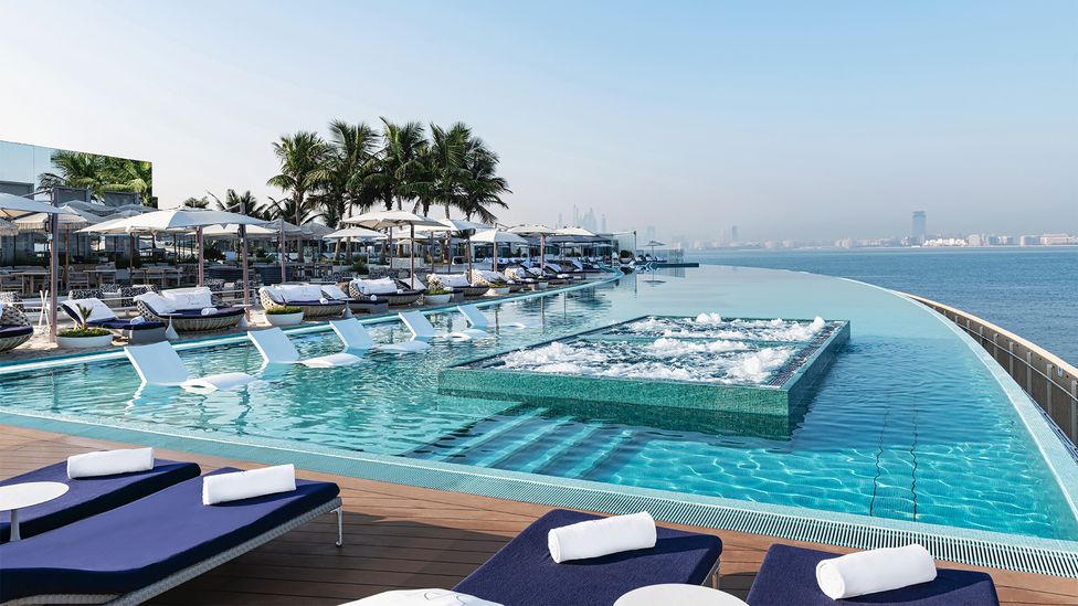 Dubai's chic beach clubs are the perfect place to unwind while taking in spectacular sunsets over the Persian Gulf (Credit: Jumeirah Burj Al Arab) Dubai's chic beach clubs are the perfect place to unwind while taking in spectacular sunsets over the Persian Gulf (Credit: Jumeirah Burj Al Arab)
