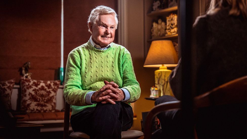 Sir Derek Jacobi sat on a chair with his hands interlinked, facing forwards (Credit: Jack Flynn)