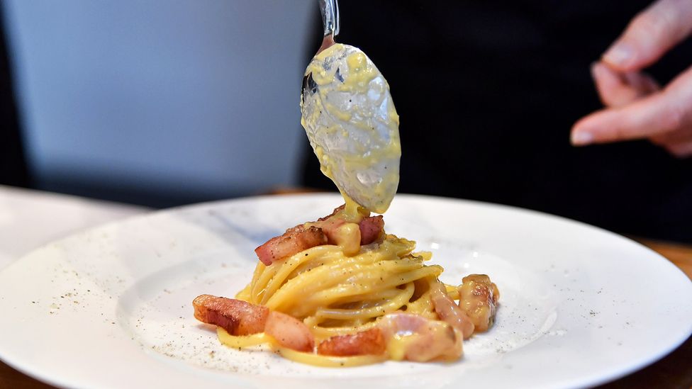 Carbonara is another controversial dish, with the "authentic recipe" including pork jowl and Roman pecorino cheese – and no cream (Credit: Getty Images) Carbonara is another controversial dish, with the "authentic recipe" including pork jowl and Roman pecorino cheese – and no cream (Credit: Getty Images)