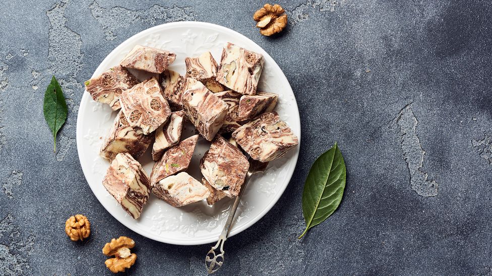 Shqiptarët duhej të gatuanin disa gatime fetare, si hallva, fshehurazi gjatë komunizmit (Credit: Alamy)