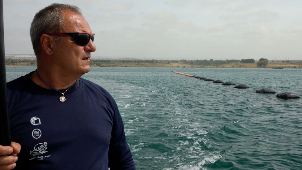 Giovanni Fanelli pictured looking out to sea wearing black sunglasses (Credit: Naomi Mihara)