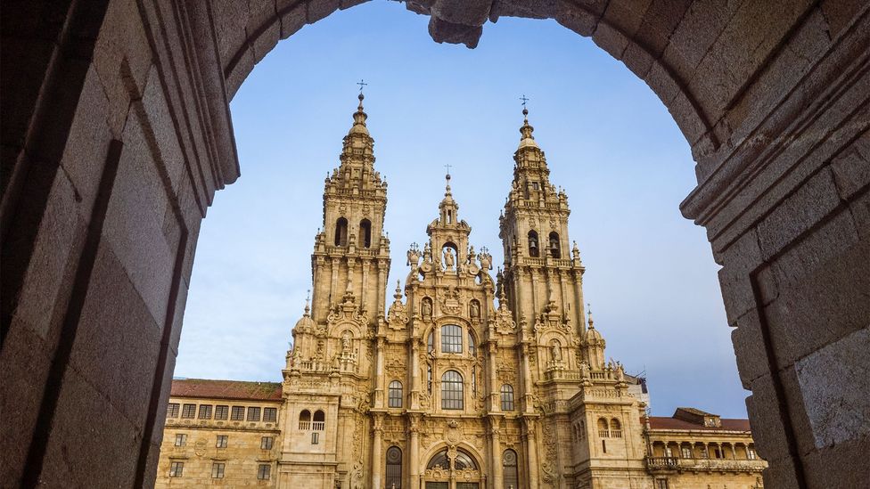Cathedral of Santiago de Compostela in Galicia, Spain, viewed through an archway (Credit: Getty Images)