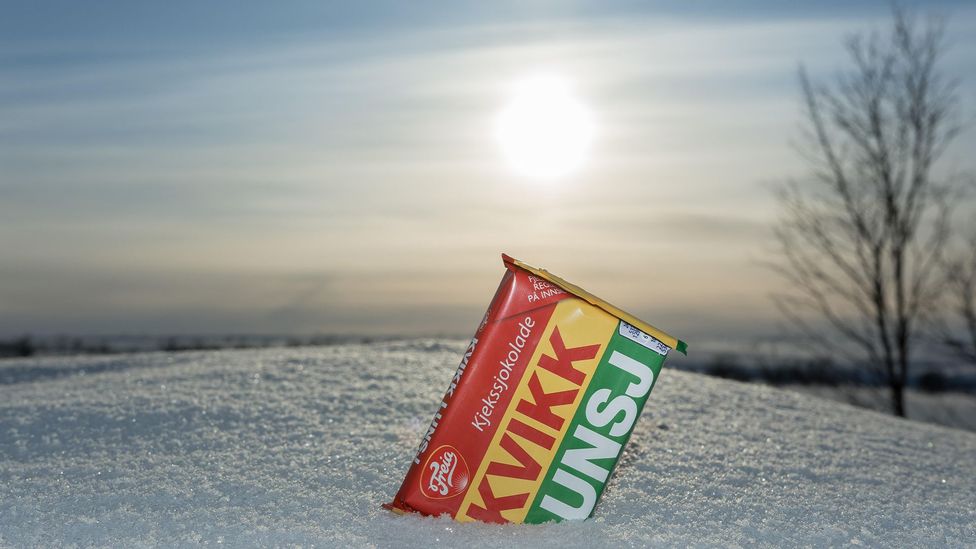 A bar of Kvikk Lunsj embedded in the snow Credit: (Alamy)
