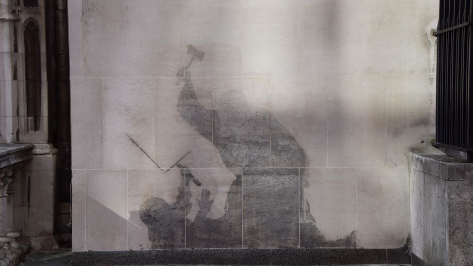 Banky's 7 September mural was partially eradicated three days later, leaving a ghostly trace (Credit: Getty Images)