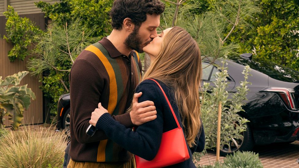 Adam Brody and Kristin Bell kissing in Nobody Wants This (Credit: Netflix)