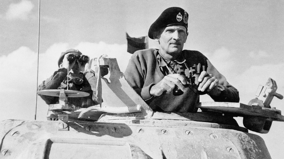 Monty wearing beret and holding binoculars in tank (Credit: Getty Images)