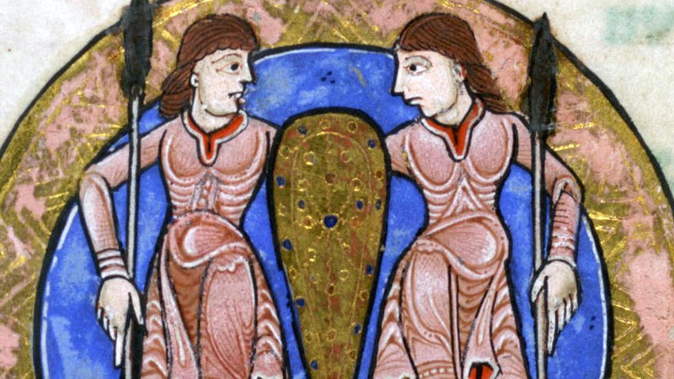Medieval illustration of two people holding spears but sharing a shield (Credit: Getty Images)