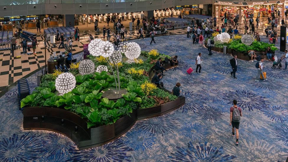 Wide sightlines, clear wayfaring and uncluttered concourses are designed to keep passengers moving smoothly through the terminal (Credit: Getty Images)