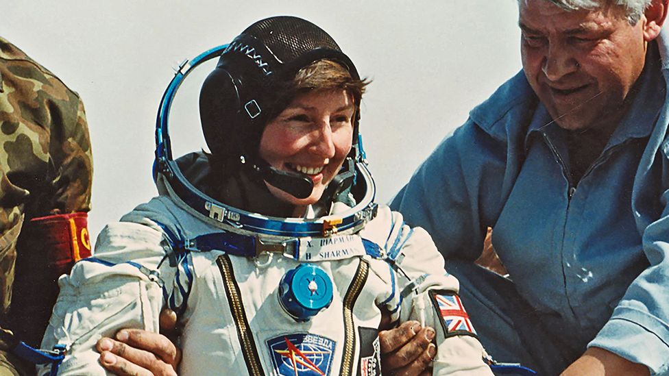 Helen Sharman in astronaut gear next to two men (Credit: Courtesy of Helen Sharman)