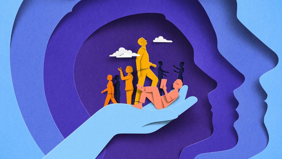 An abstract illustration featuring paper cut-outs of people going about their work in the palm of someone’s hand (Credit: Eiko Ojala)