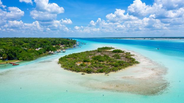 The beauty of Lake Bacalar Bacalar, according to Claudio Del Valle, goes deeper than the Mexican lagoon's seven brilliant shades of blue, which range 