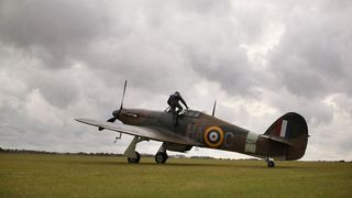 Pilot climbing into Hurricane (Credit: Oli Scarff/Getty Images)