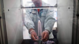 Researchers are striving for the "perfect condom" in the hope of encouraging more people to use them (Credit: Behrouz Mehri/AFP/Getty Images)